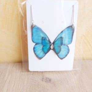 Double papillon bleu avec un strass de Swarovski